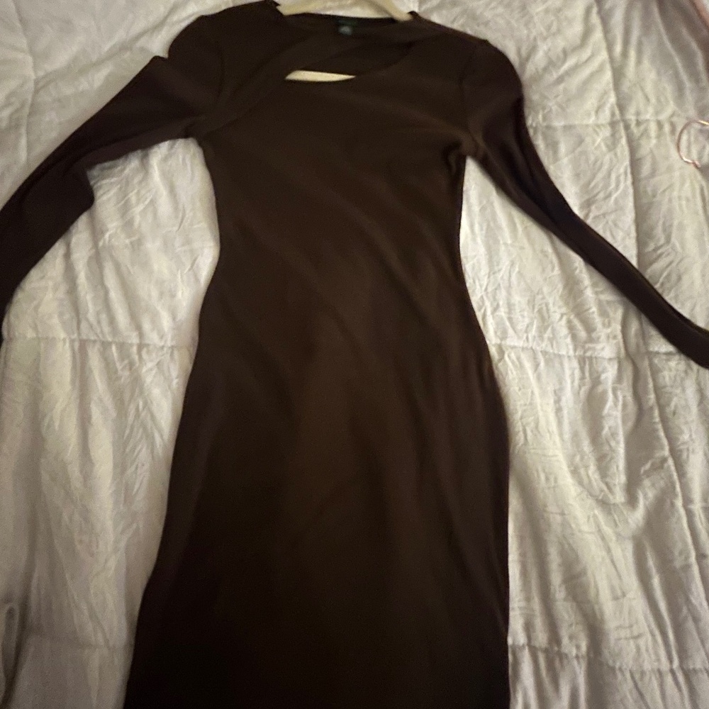 A brown long sleeve dress with a slit on the top chest